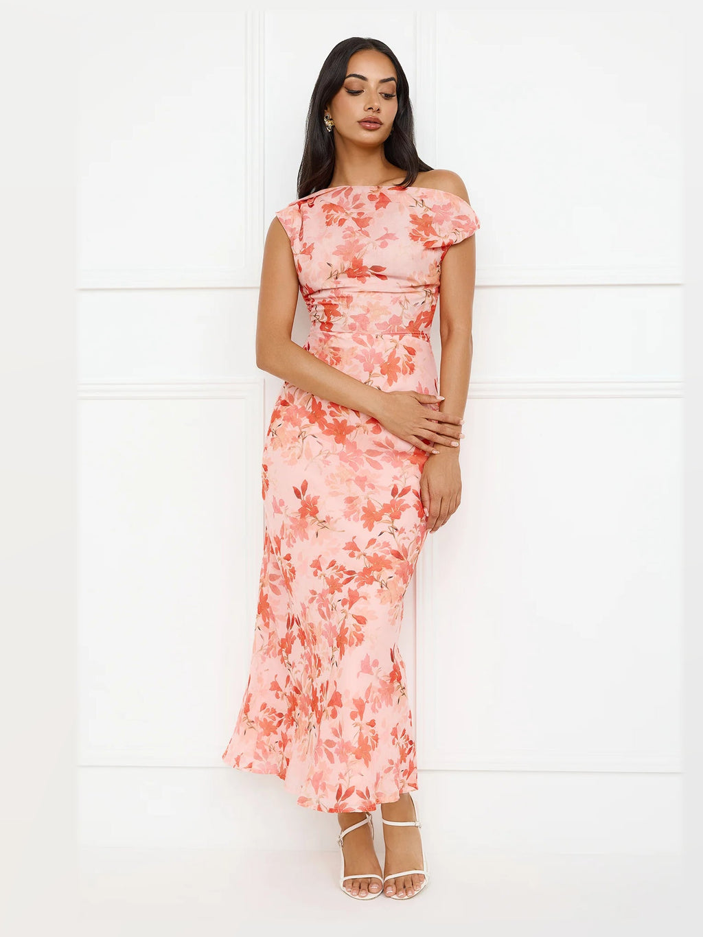 Orange formal dress with a-line silhouette and maxi length