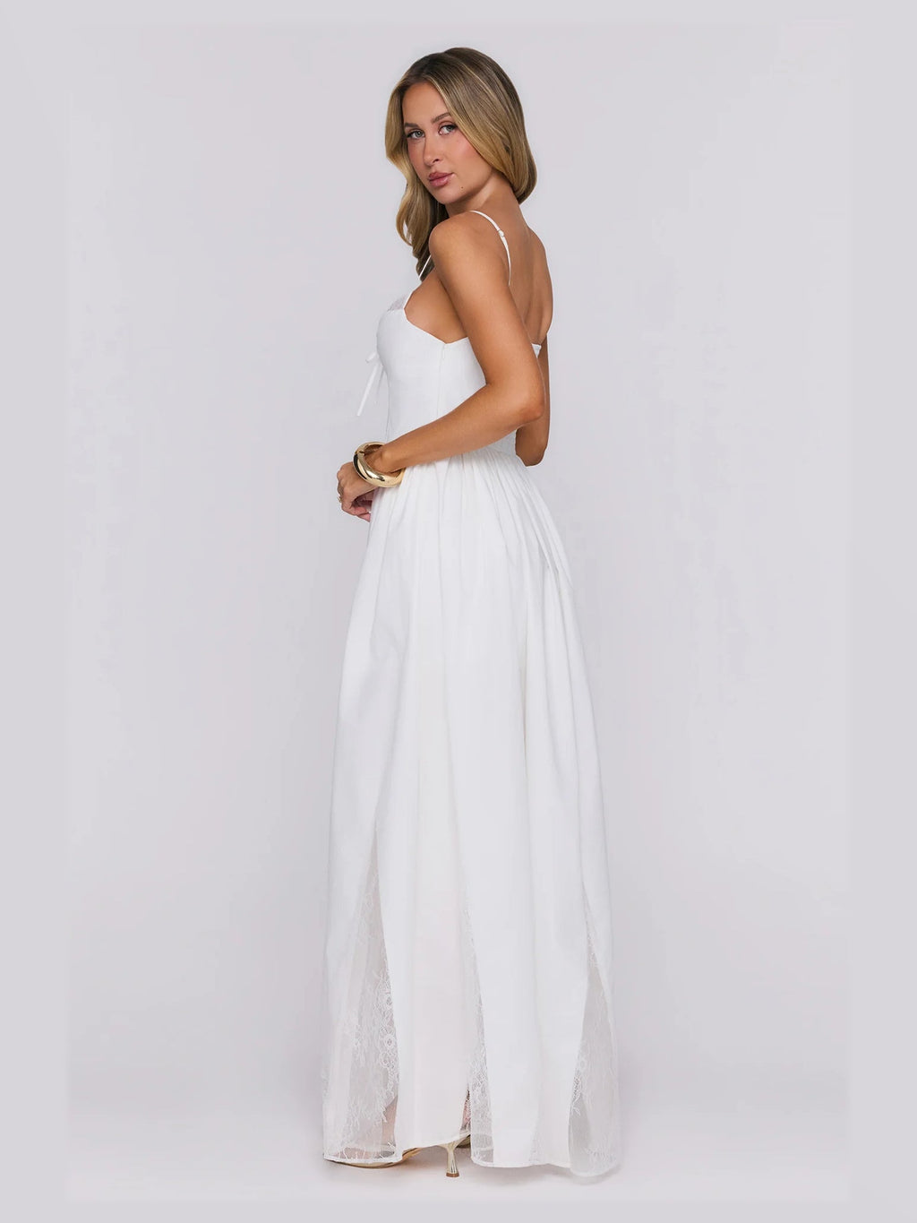 White formal dress with a-line silhouette and maxi length