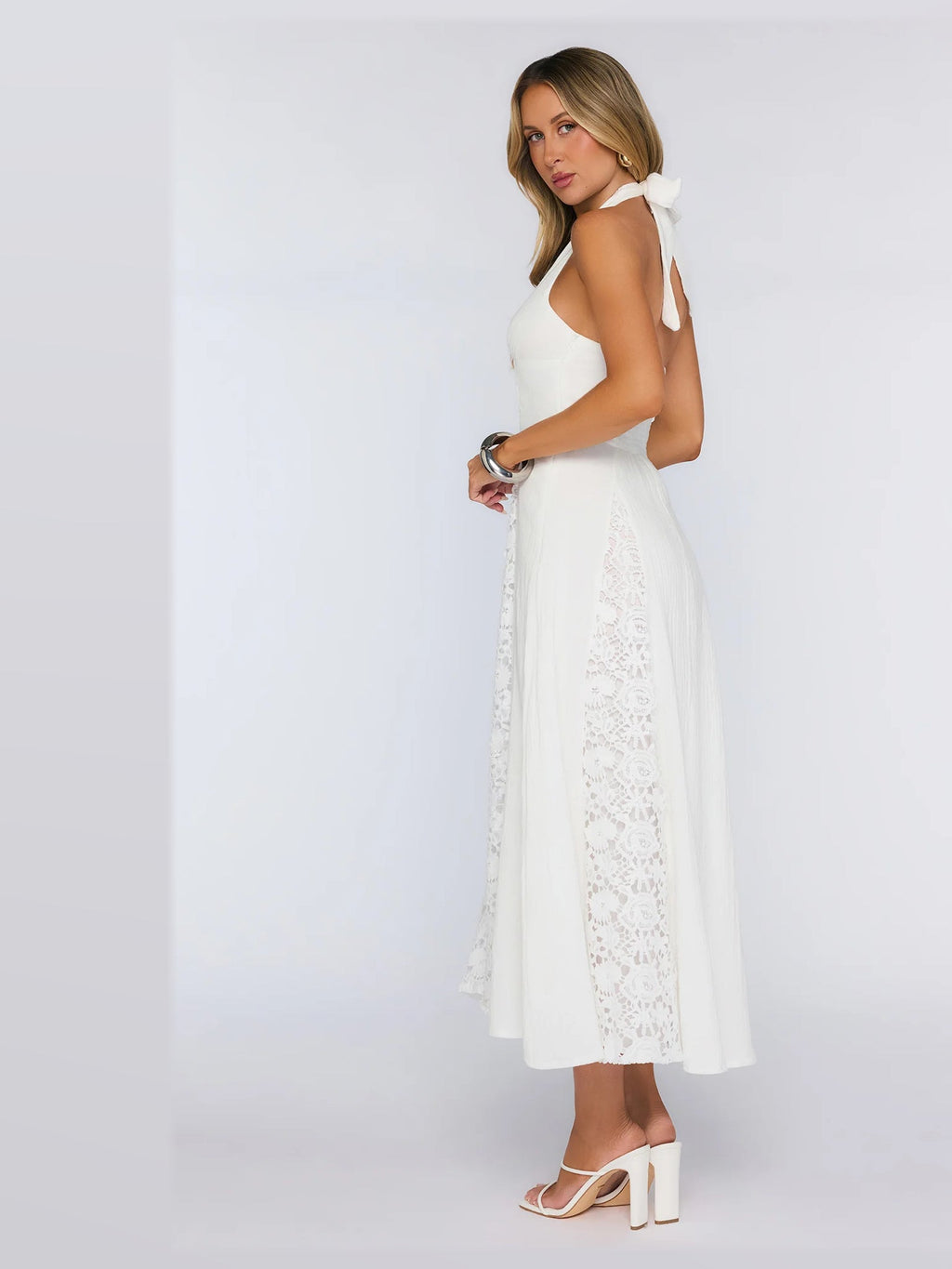 White formal dress with a-line silhouette and maxi length
