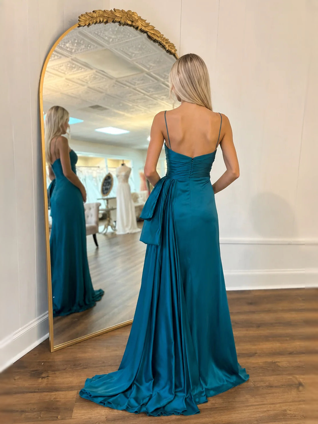Teal floor-length prom dress, front view showing the a-line silhouette