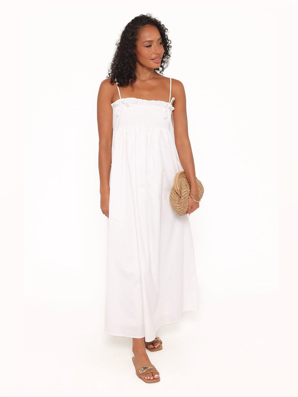 White formal dress with a-line silhouette and maxi length