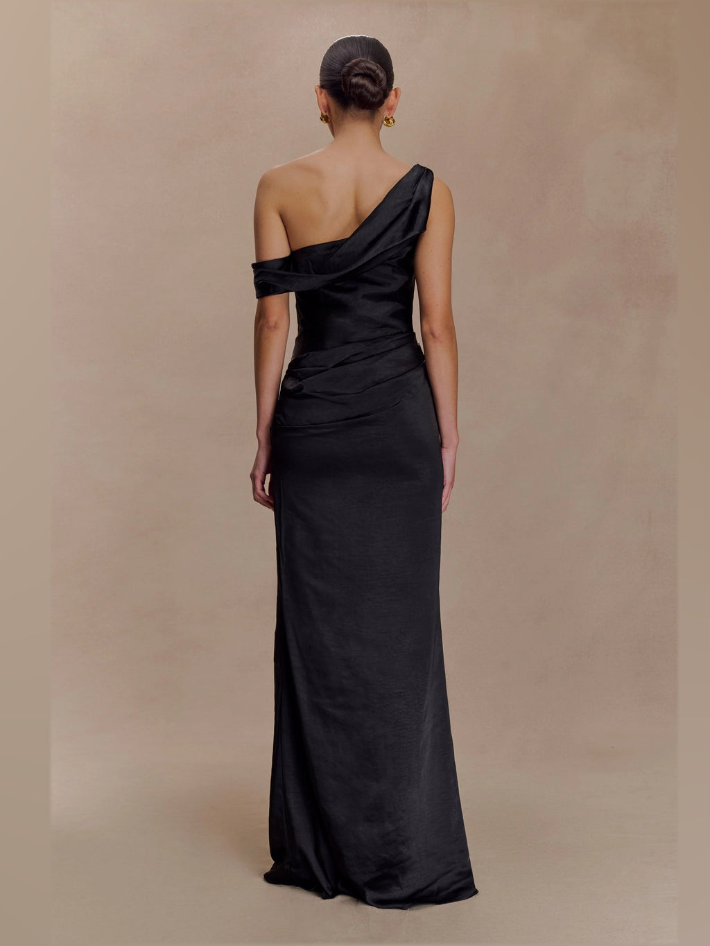 Black formal dress with satin construction and maxi hem