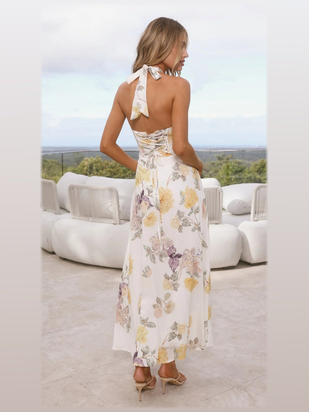 Teal formal dress with structured woven fabric construction and maxi hem