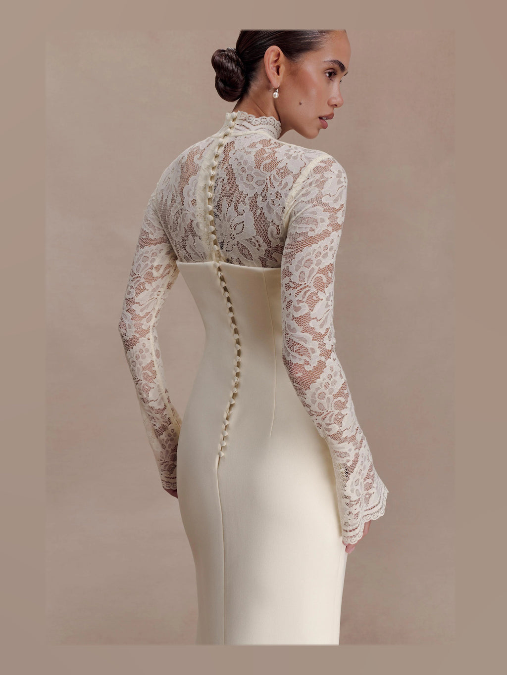 Ivory formal dress with mesh construction and maxi hem