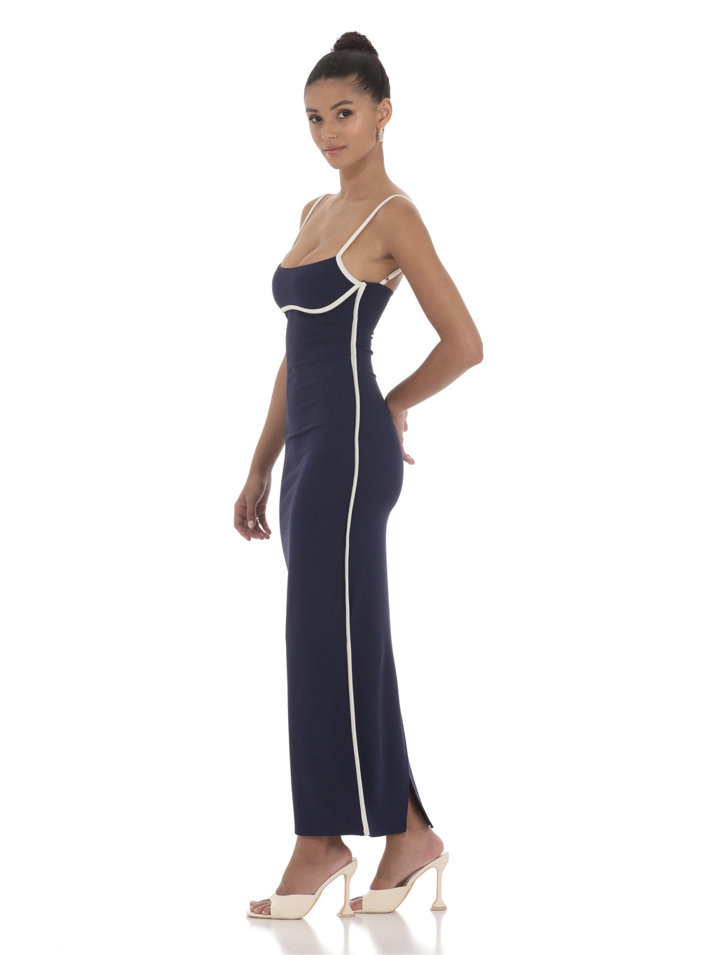 Navy bridesmaid dress with structured woven fabric construction and maxi hem