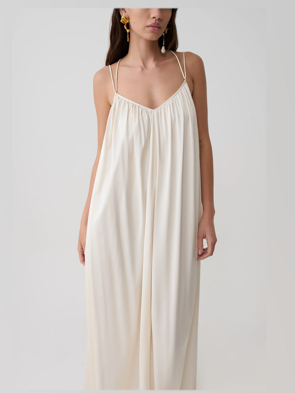 Buttercream formal dress with satin construction and maxi hem