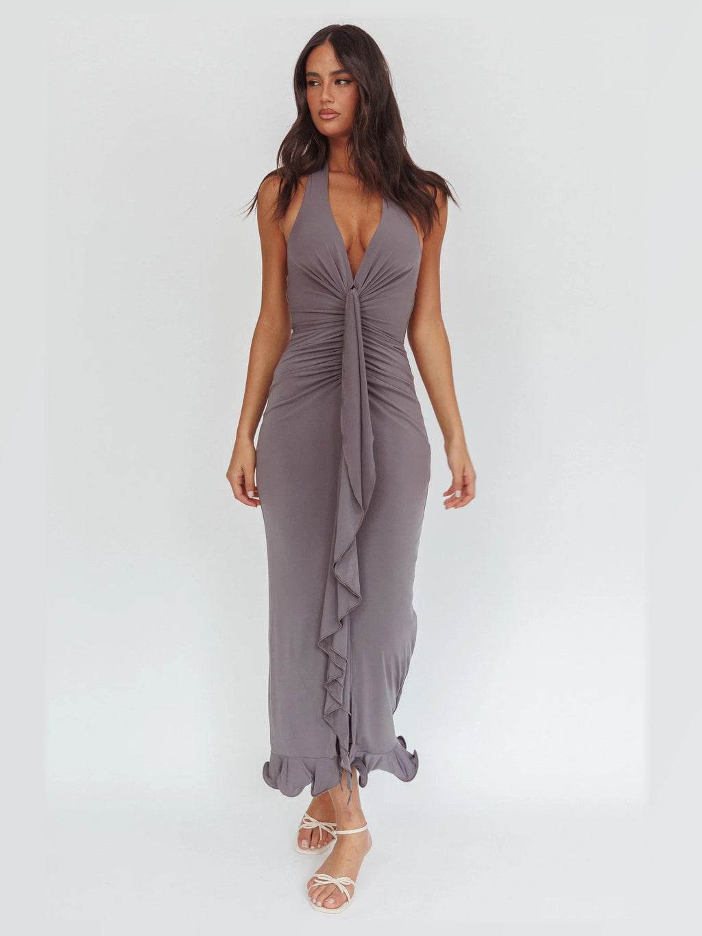 Taupe formal dress with structured woven fabric construction and maxi hem