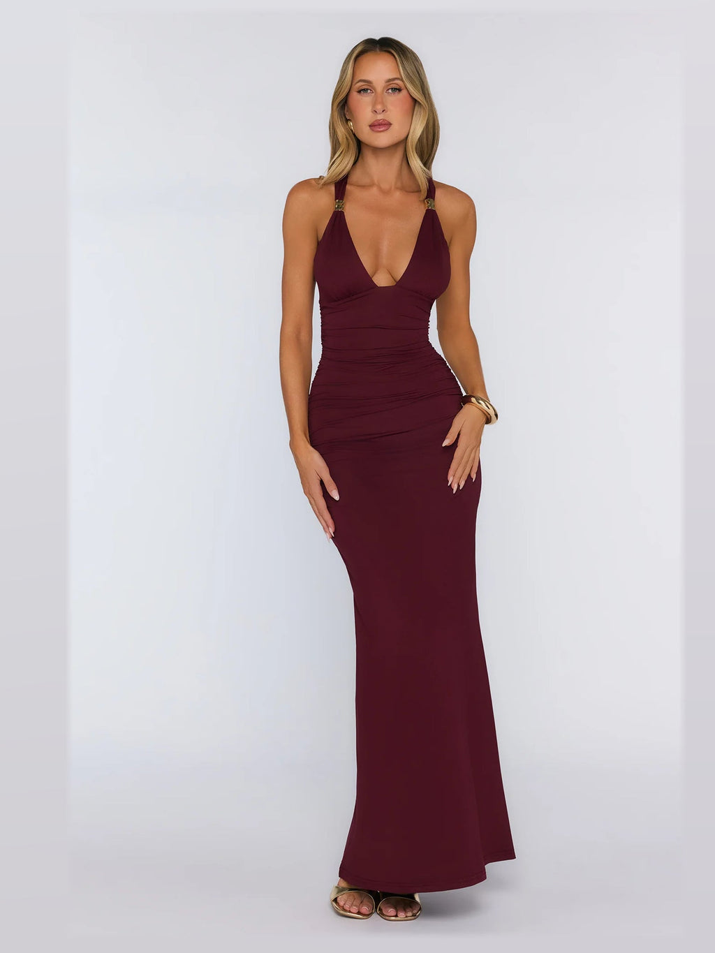 Burgundy formal dress with structured woven fabric construction and maxi hem