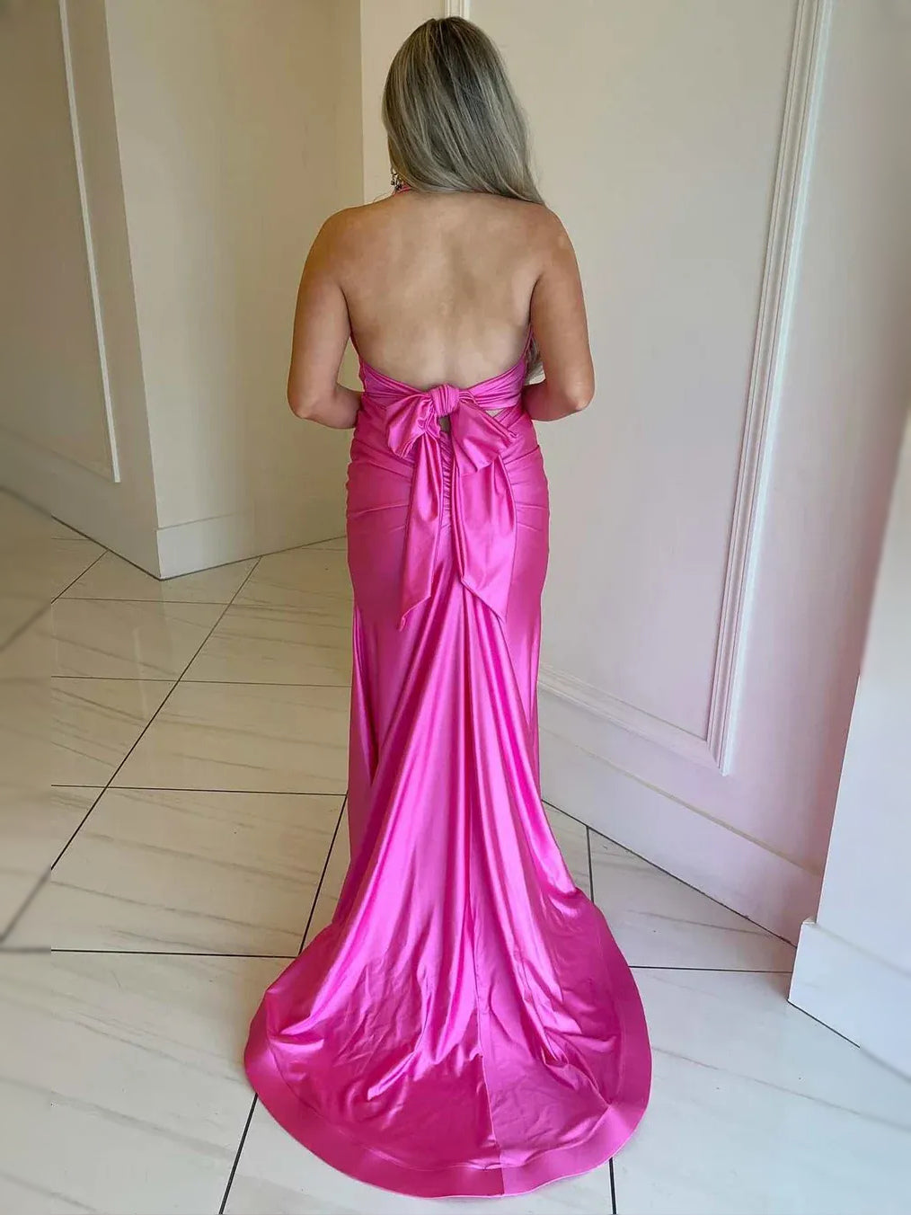 Hot Pink maxi prom dress, back view showing the rear of the dress from another angle