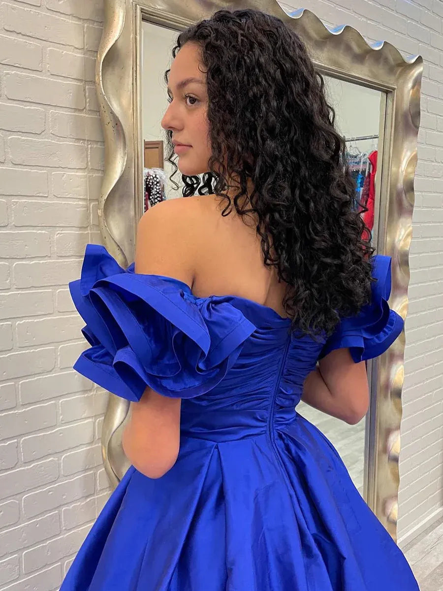 Royal Blue maxi prom dress, back view showing the rear of the dress in an additional pose