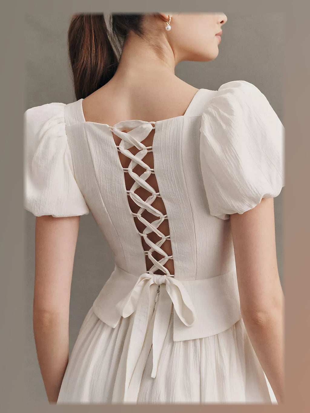 Ivory formal dress with corset detailing
