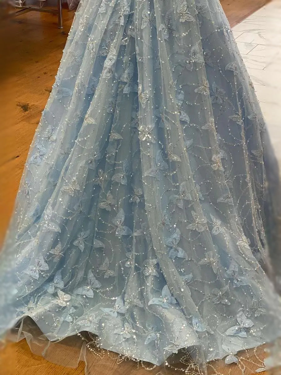 Sky Blue maxi prom dress, back view showing the rear of the dress highlighting the overall dress