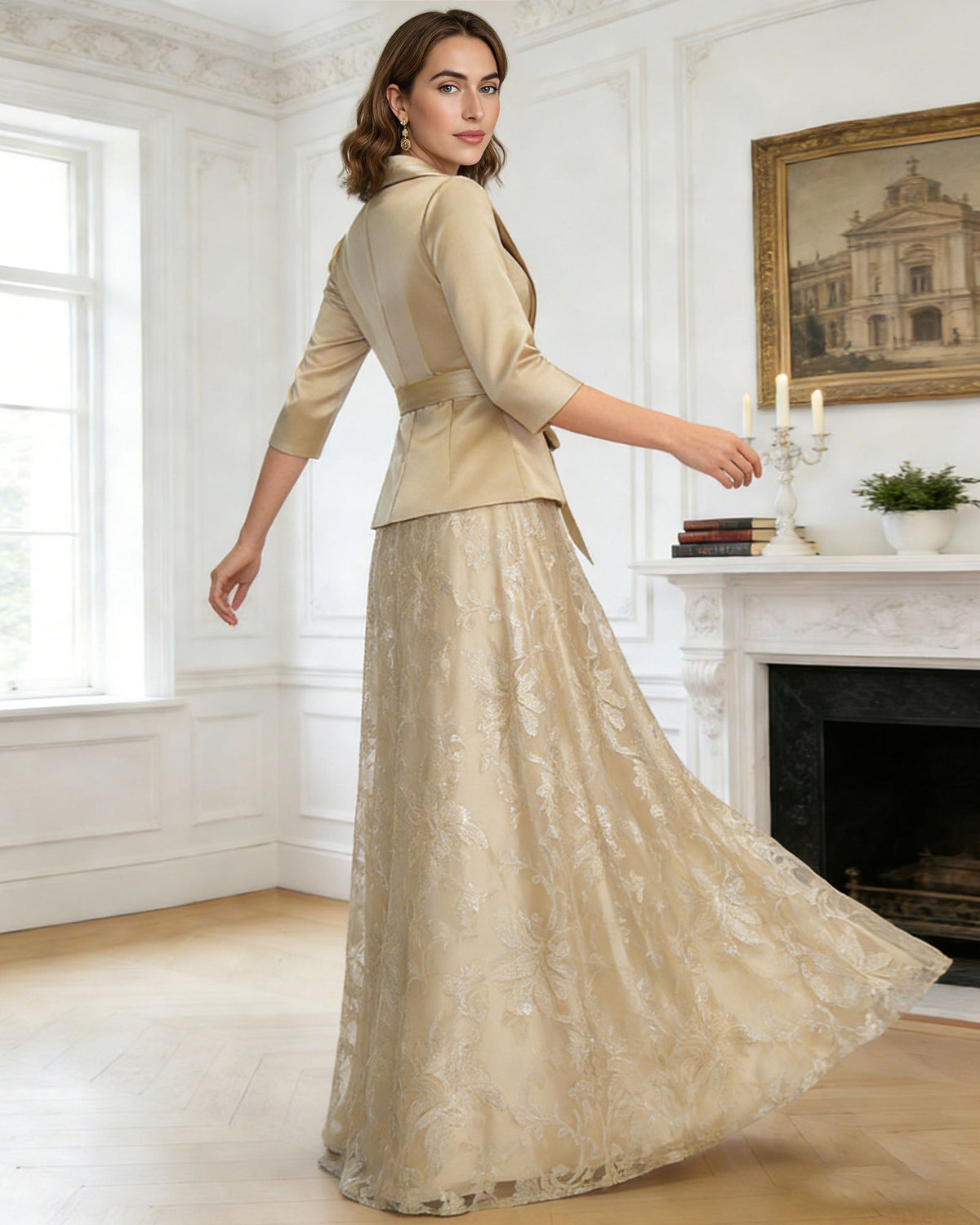 two piece mother of the bride outfit with satin wrap top, waist tie, and embroidered floor length skirt alternate angle showing the formal dress silhouette and drape