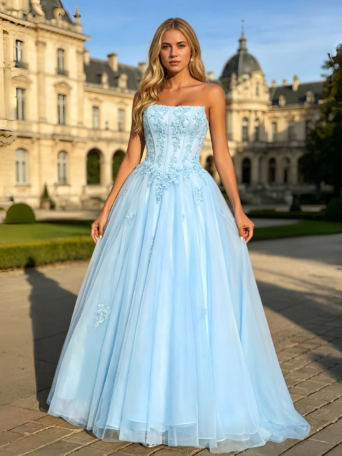 back or alternate view of strapless lace corset ball gown with tulle a-line skirt with formal styling.